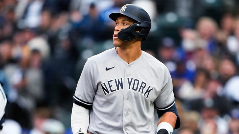 New York Yankees designated hitter Aaron Judge heads to the...