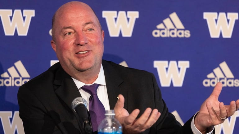 University of Washington's new Athletic Director Troy Dannen meets with...